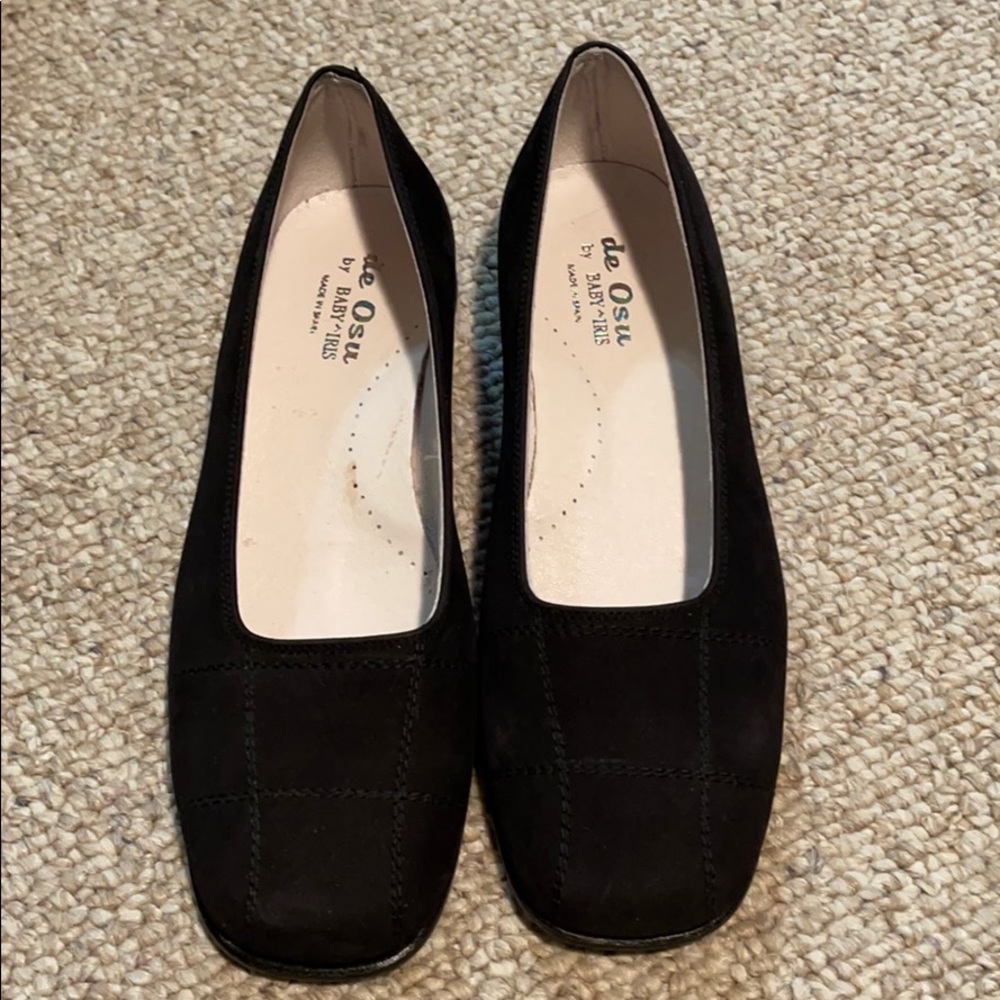 Black suede low heel flats made in Spain
